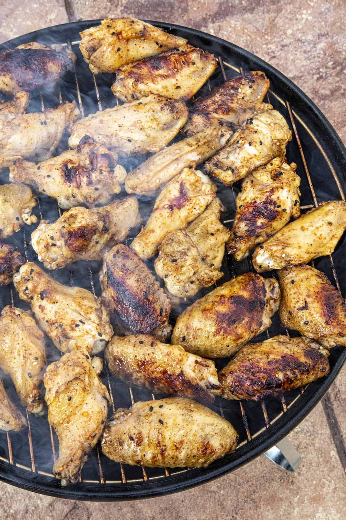 Grilled chicken on the grill, nicely charred