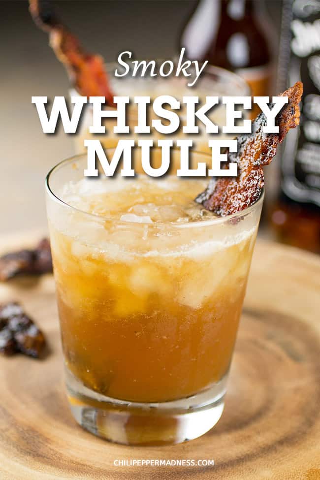 Smoky Whiskey Mule Cocktail - A refreshing and summery whiskey mule cocktail recipe made with ginger beer, whiskey, lemon juice and candied bacon. Whiskey lovers rejoice! #whiskey #moscowmule #cocktail