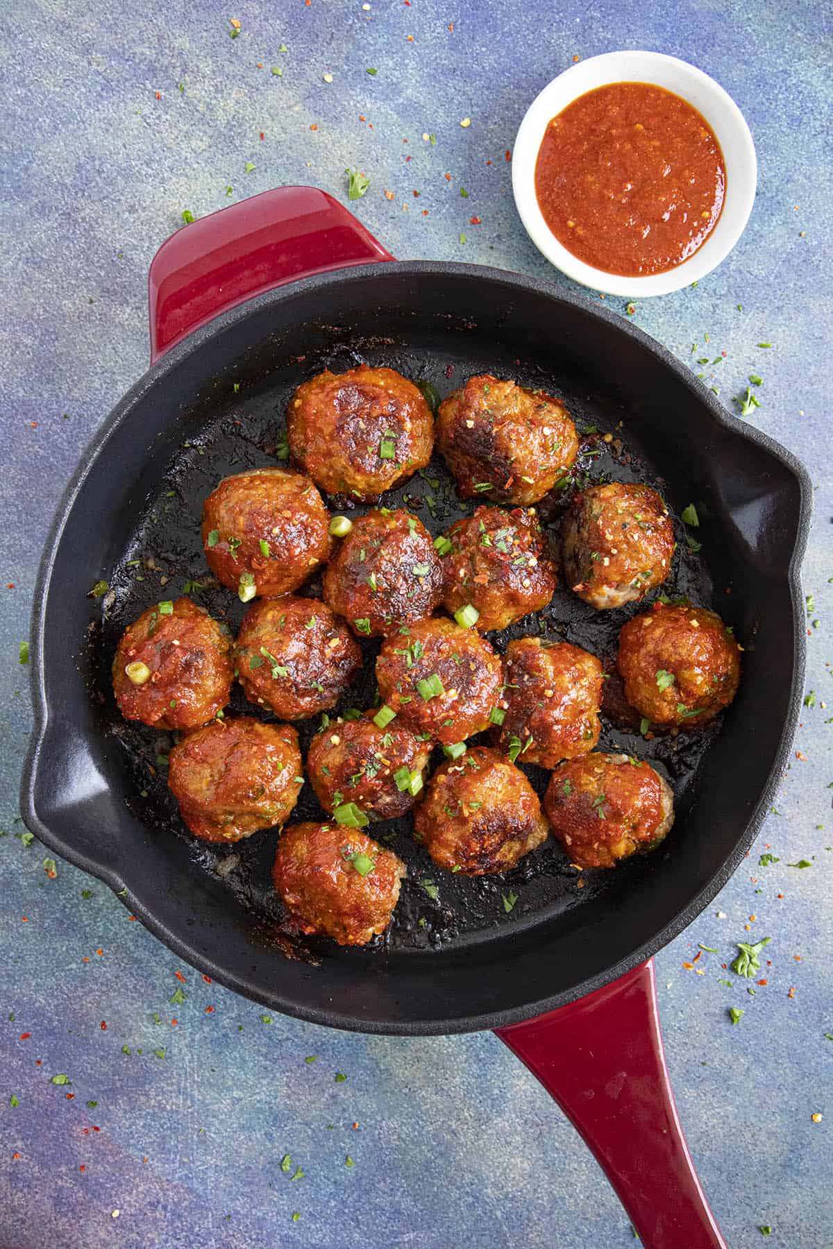 Honey Sriracha Turkey Meatballs in a pan, ready to serve.