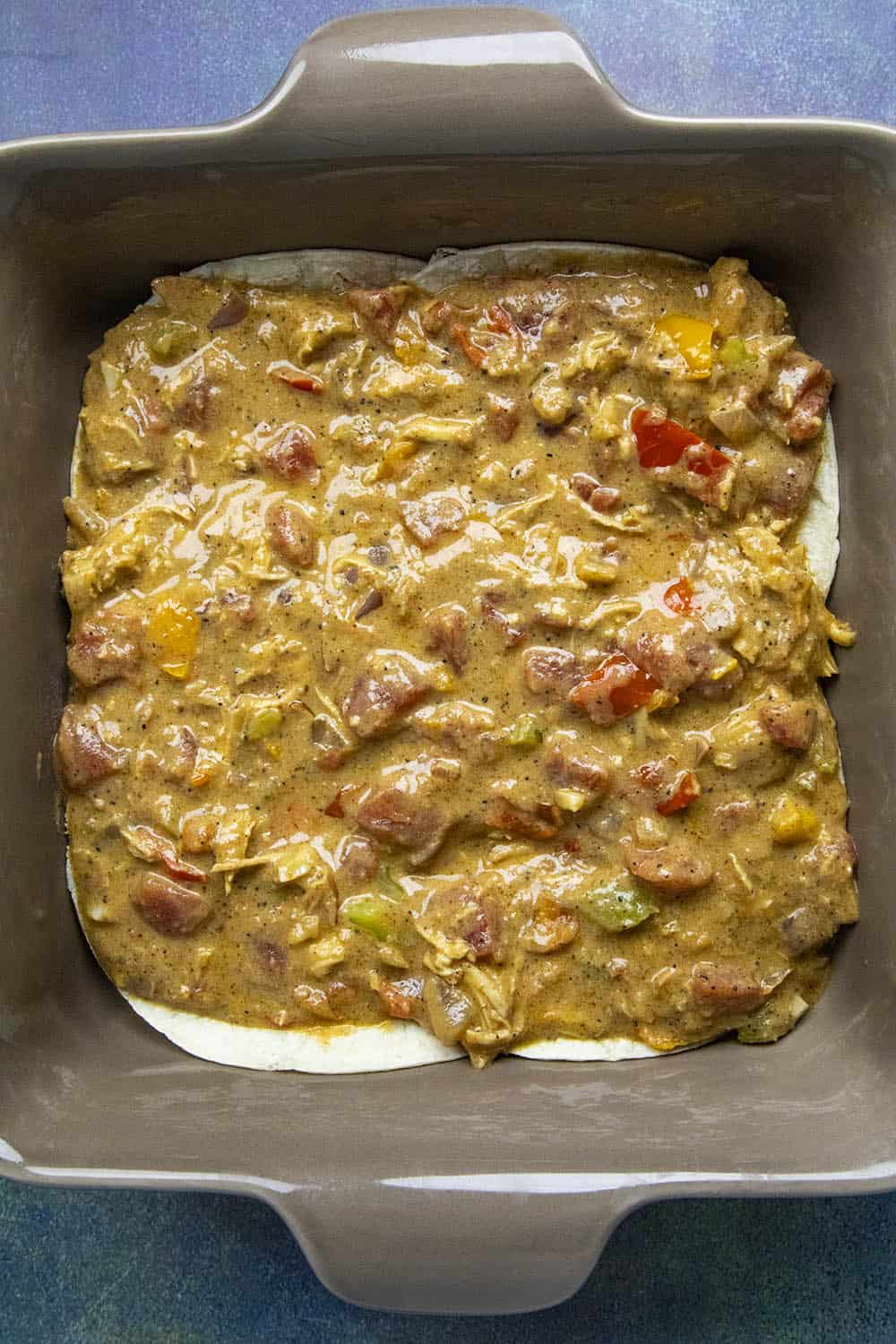 Layering in the filling of the King Ranch Casserole
