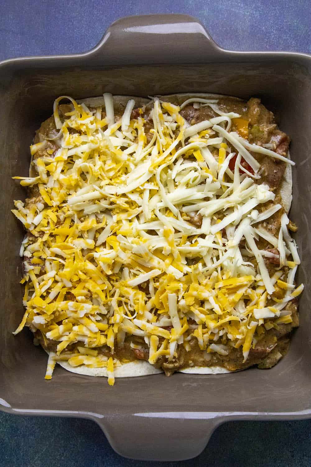 A layer of cheese on the King Ranch Casserole.