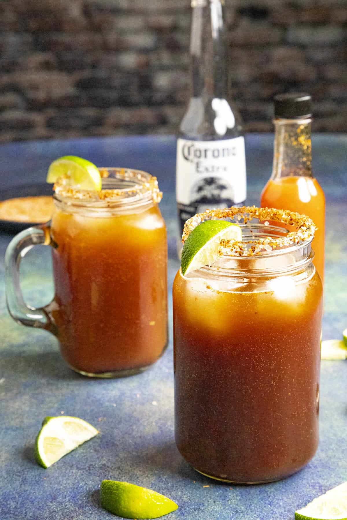 Two micheladas, Mexican beer and Clamato juice cocktails