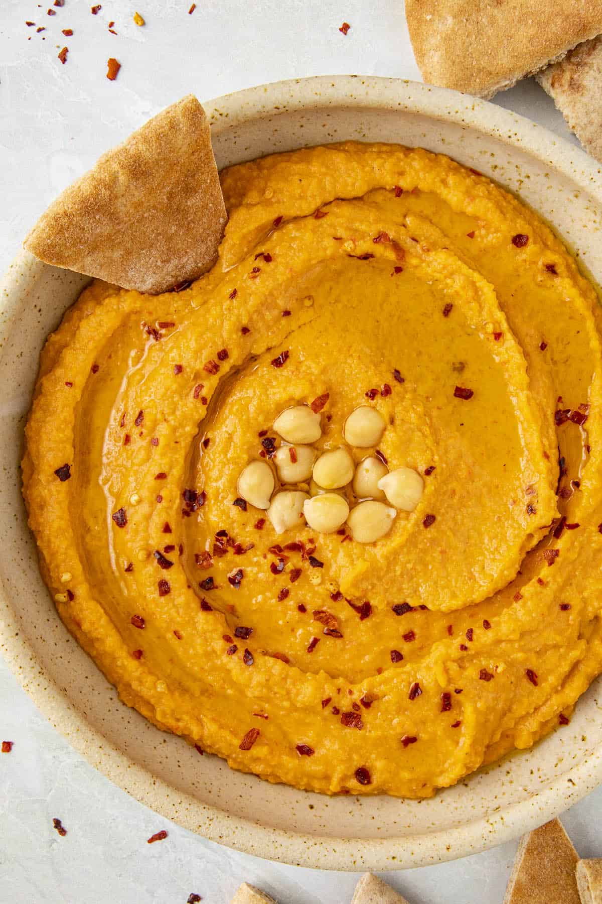 Roasted Red Pepper Hummus in a bowl, ready to serve