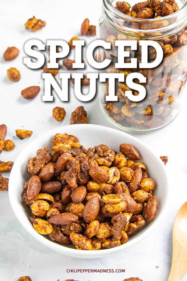 Spiced Nuts - My spiced nuts recipe is sweet and spicy, made with pecans, almonds and peanuts with smoky chili powder and cayenne. It\'s the perfect spicy snack or appetizer. #SpicySnack #SpicedNuts #SpicedPecans