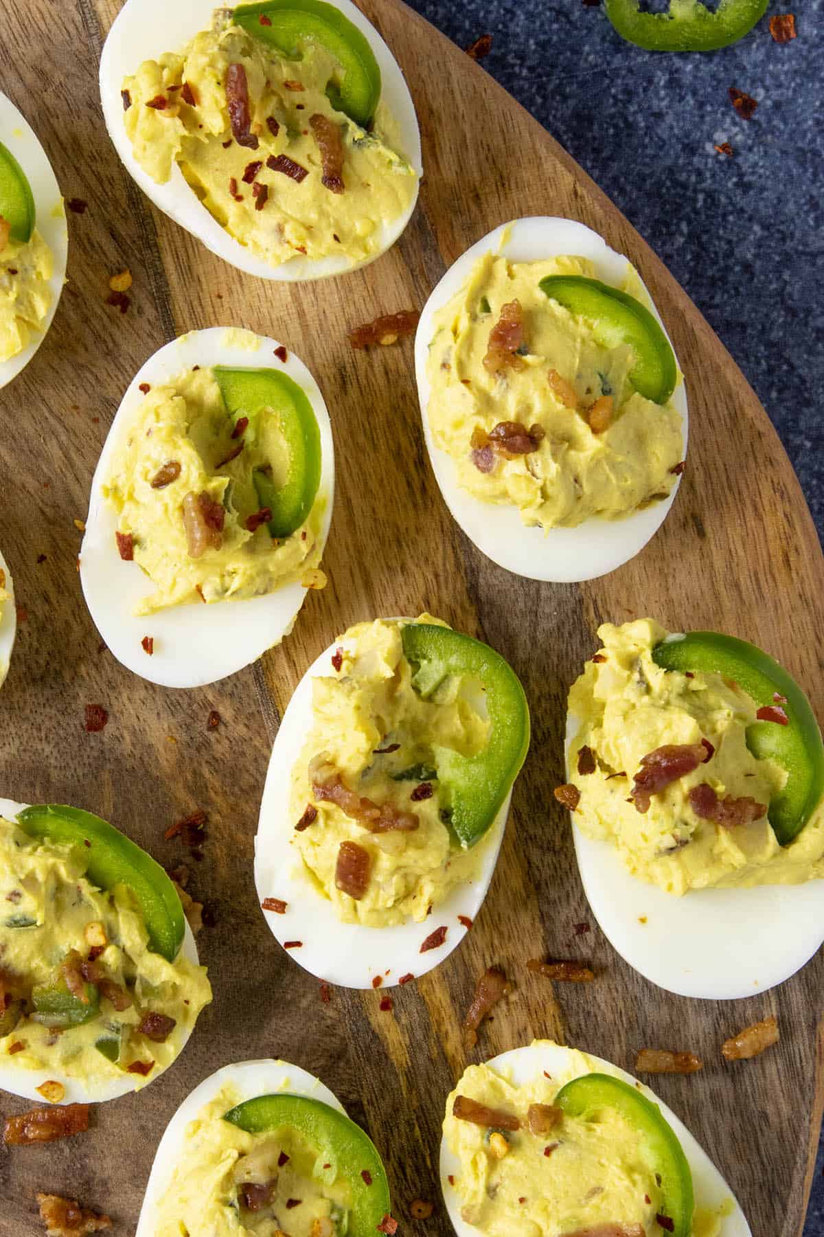 Spicy Deviled Eggs with Bacon and Jalapeno on a platter, ready to serve