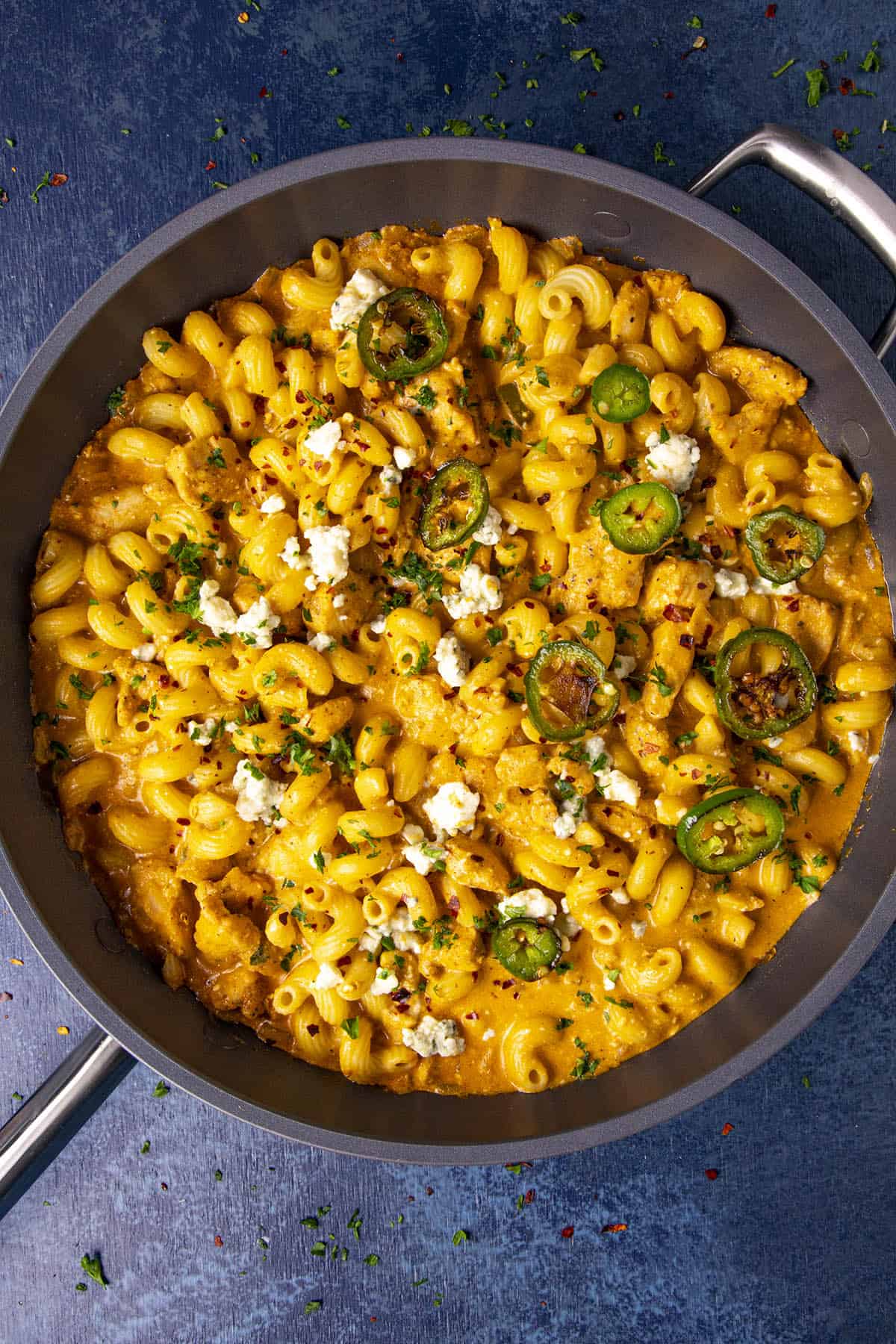 Garnishing my Buffalo Chicken Pasta in the pan for serving.