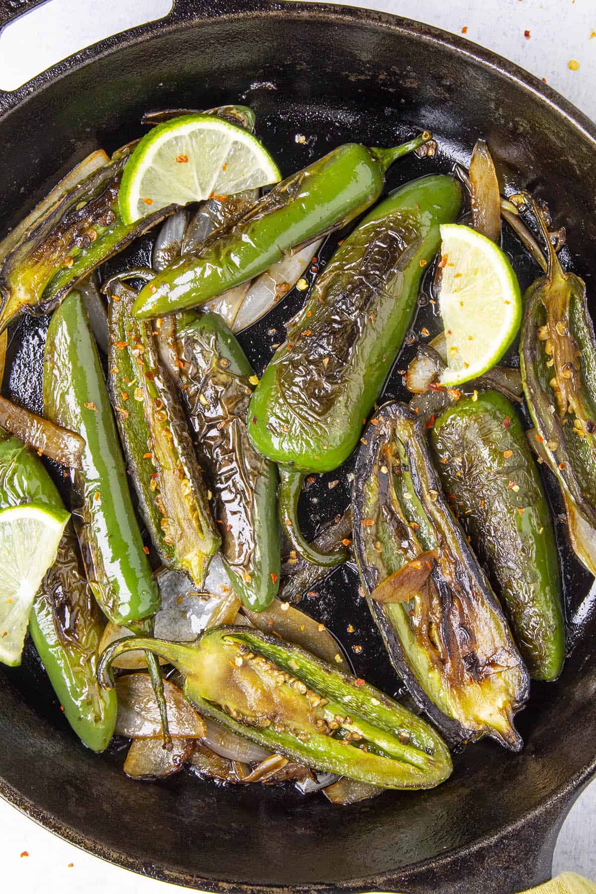 Chiles Toreados, or blistered chiles, in a pan, ready to serve