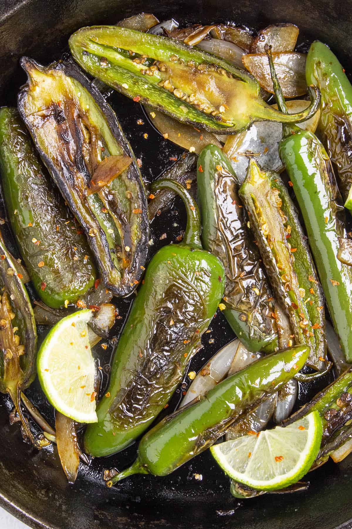 Chiles Toreados, or blistered chiles, in a pan