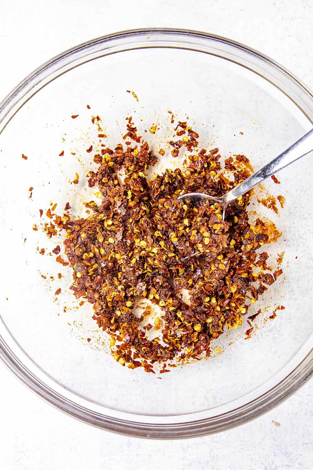 Mixing the chili flakes with wet ingredients