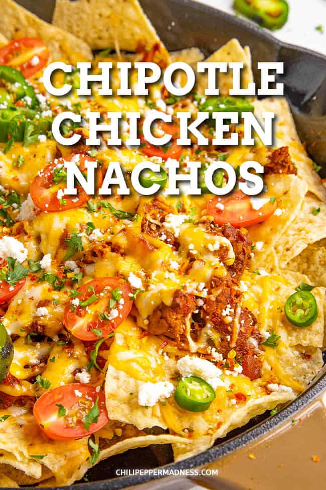 Chipotle Chicken Nachos Recipe - With this chipotle chicken nachos recipe, you\'re ready for game day! It\'s loaded with spicy chipotle chicken and topped with lots of melty cheese and more. #Nachos #ChickenNachos #GameDayEats