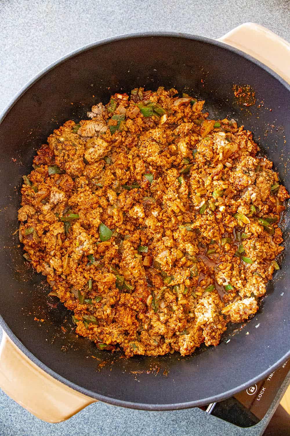 Seasoning added to the ground meat in the pan