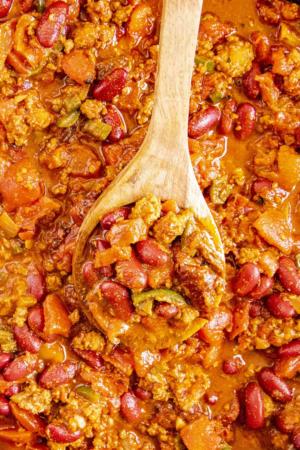 Chunky Chipotle Chili being stirred with a spoon