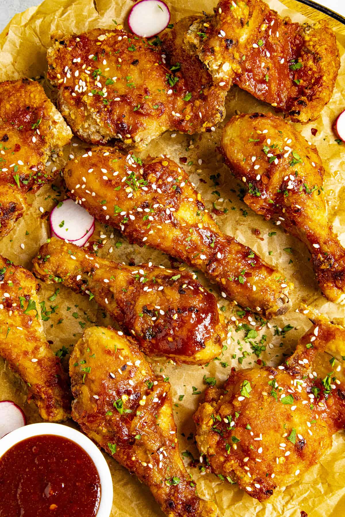 Korean Fried Chicken on a platter with garnish