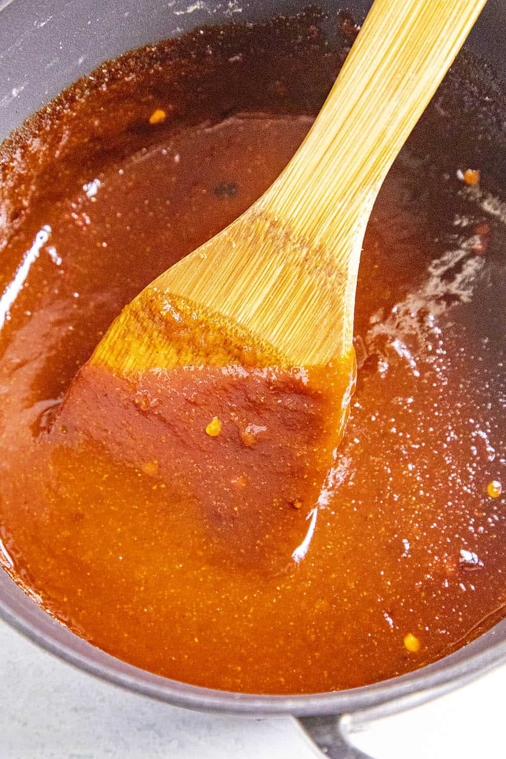 Stirring the Korean Fried Chicken Sauce in a pan