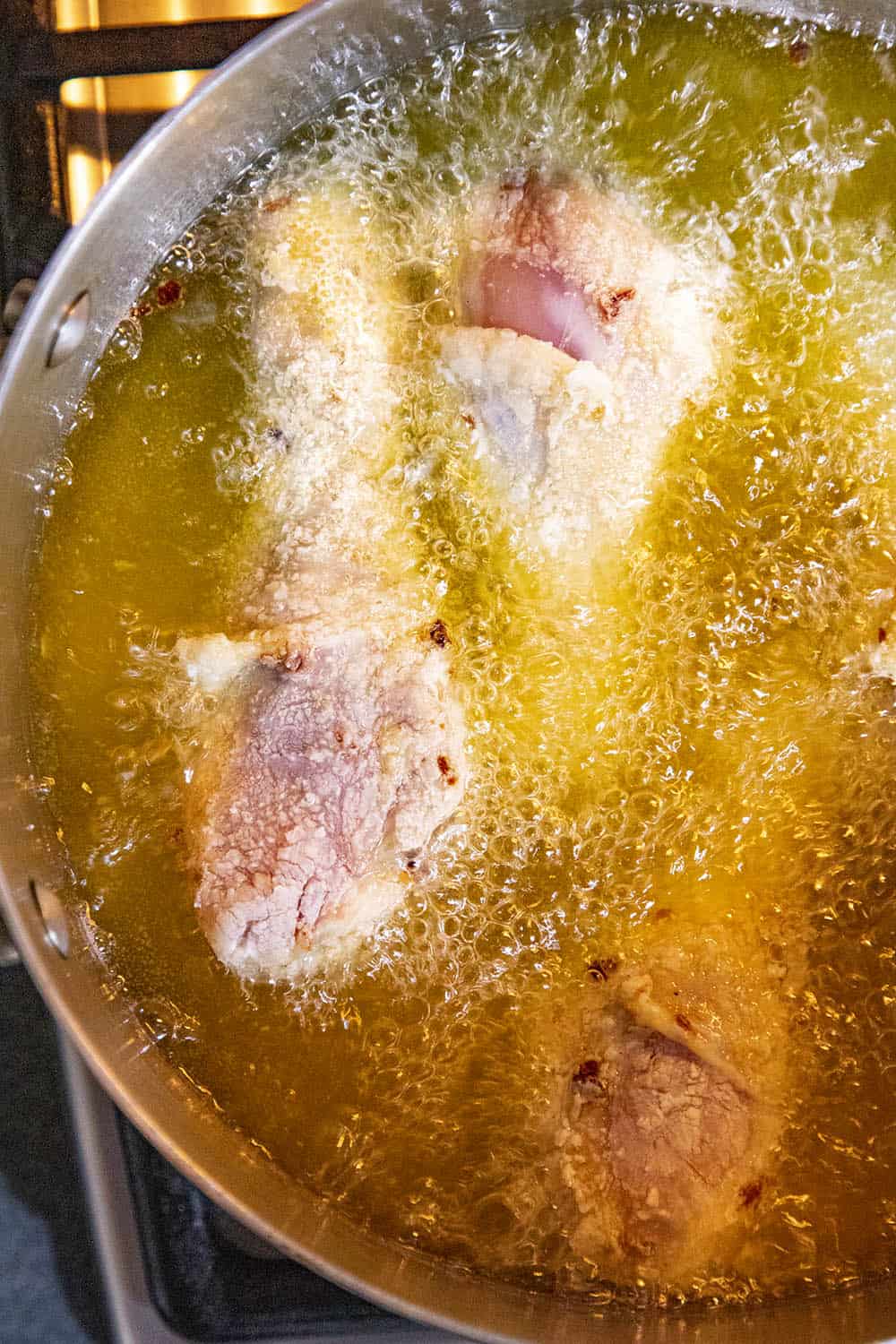 Frying the chicken in hot oil