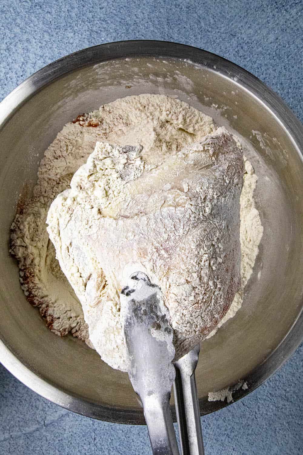 Step 2: Coating the chicken in flour