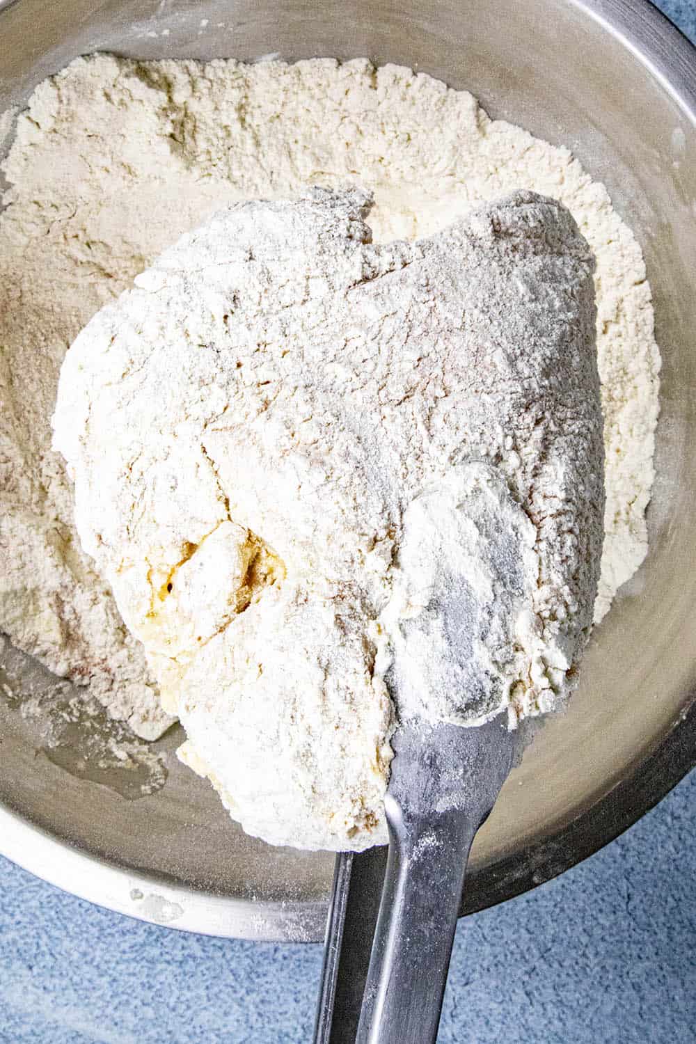 Step 4: A second dip of the chicken into flour