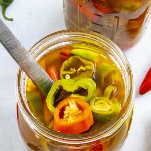 Cajun Pickled Peppers in two jars