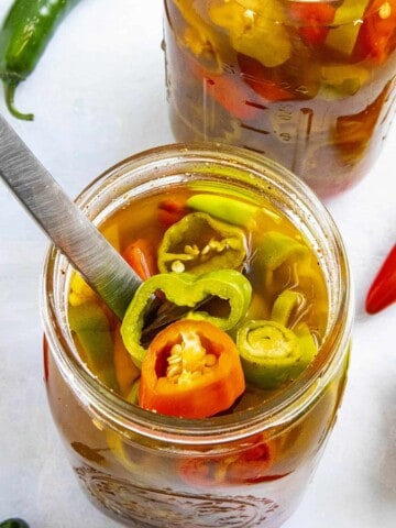 Cajun Pickled Peppers in two jars