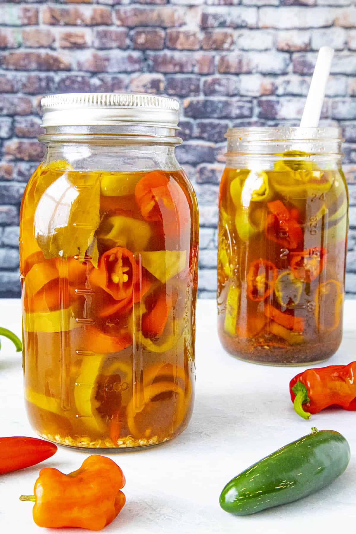 Pickled peppers in 2 jars