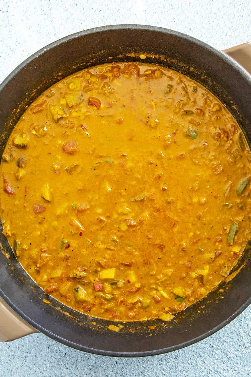 Masoor Dal (Red Lentil Curry) in a pot, simmering