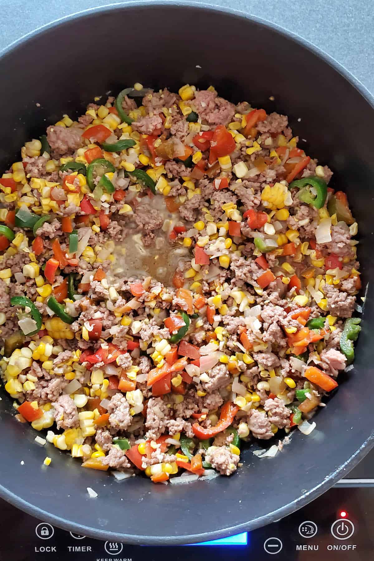 Meat and vegetables cooked down to make taco soup