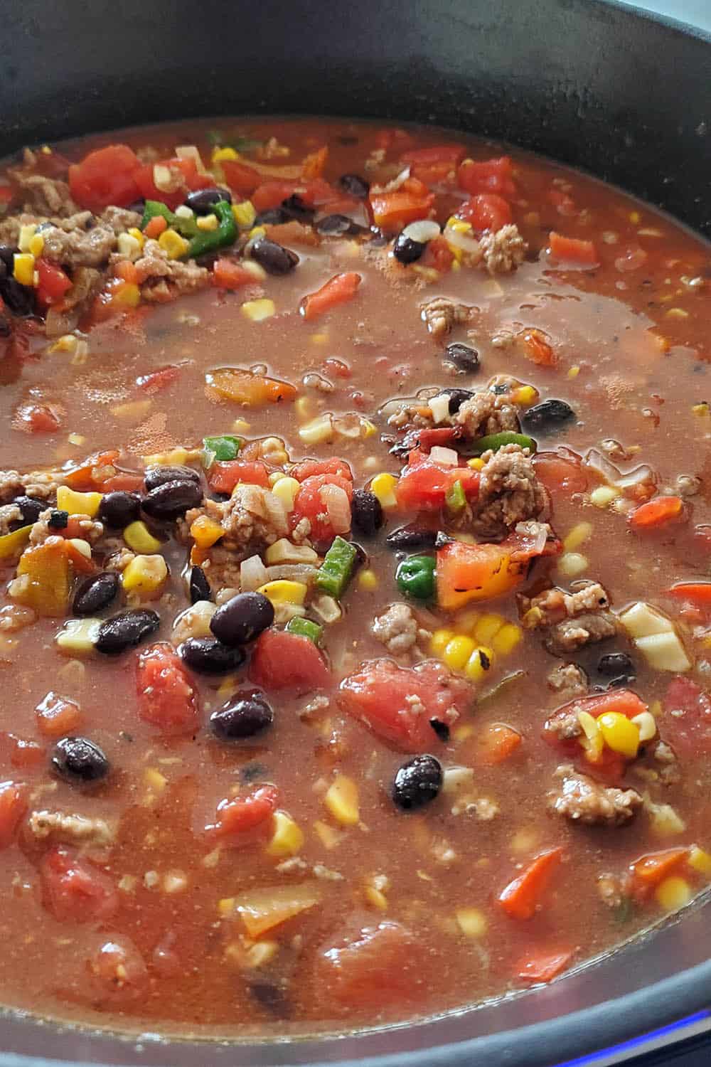 Simmering the taco soup in a pot