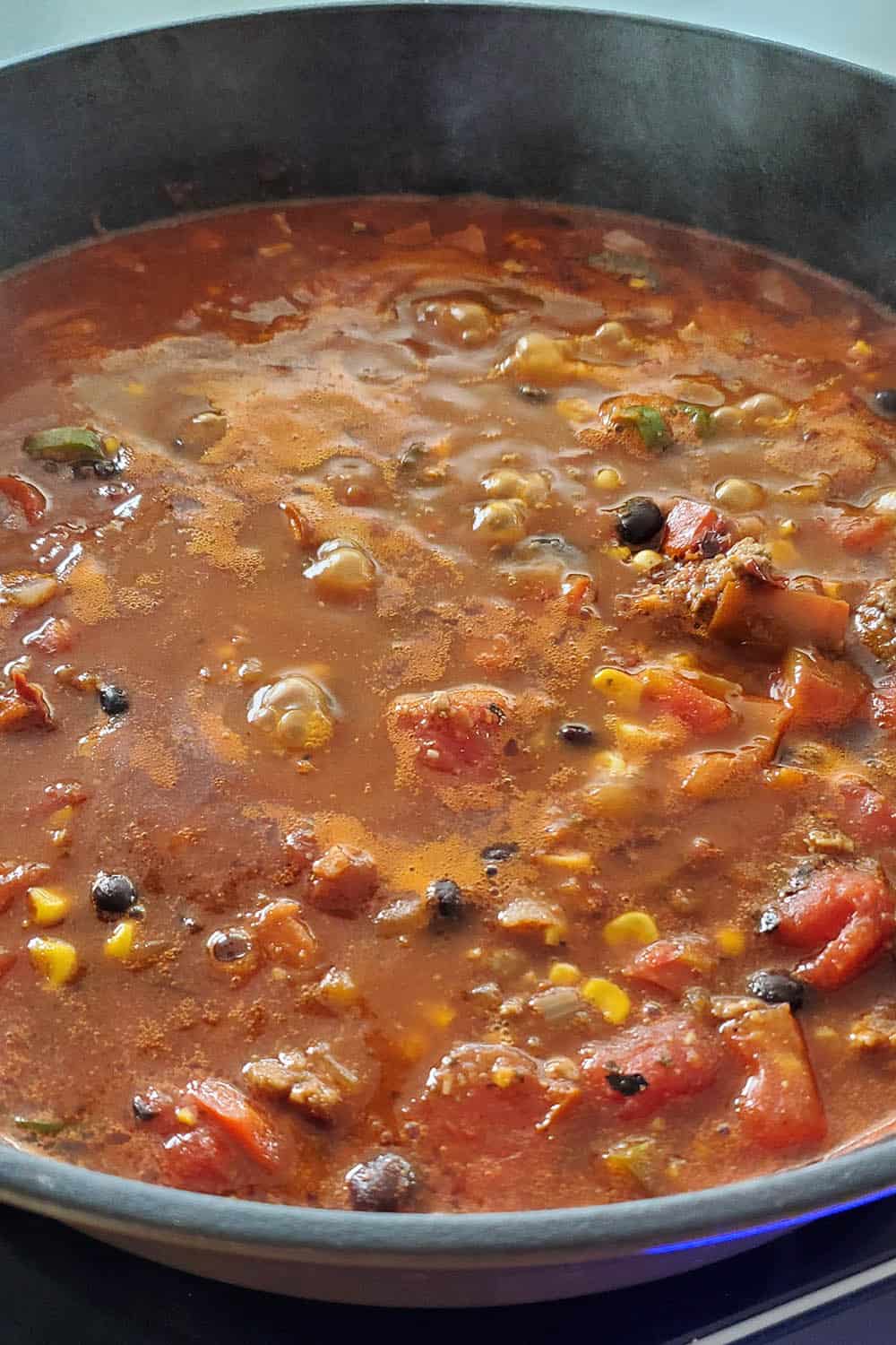 Taco soup, simmering and thickening in a pot