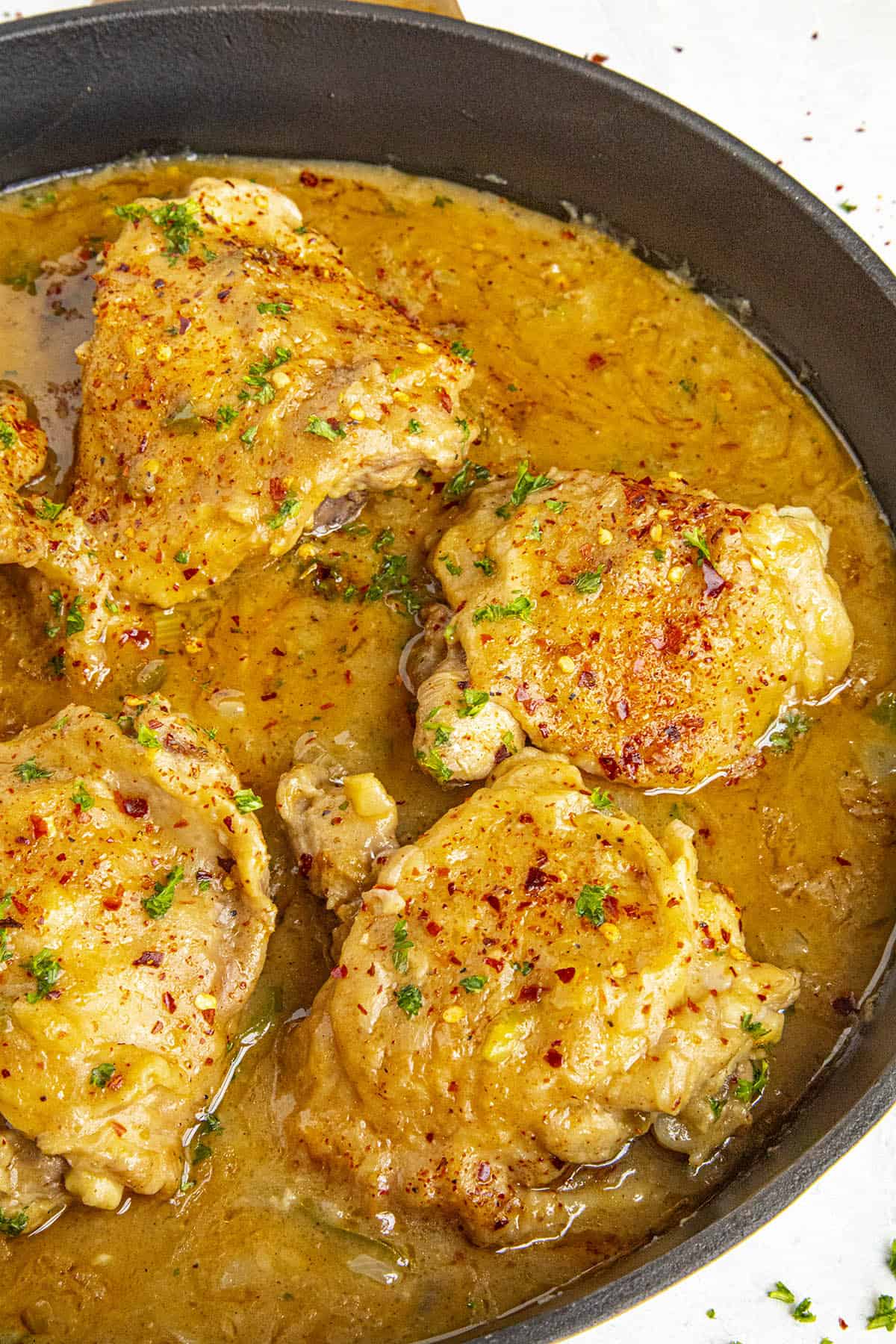 Smothered Chicken Fricassee in a hot pan, ready to enjoy