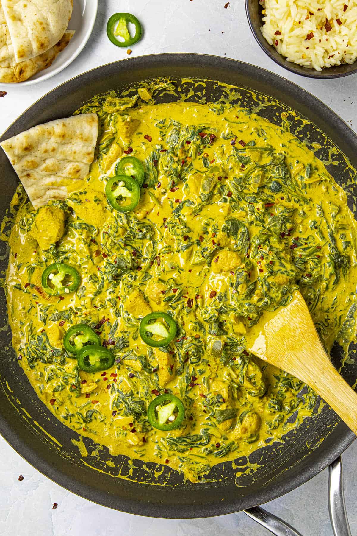 Chicken Saag in a hot pan, ready to serve