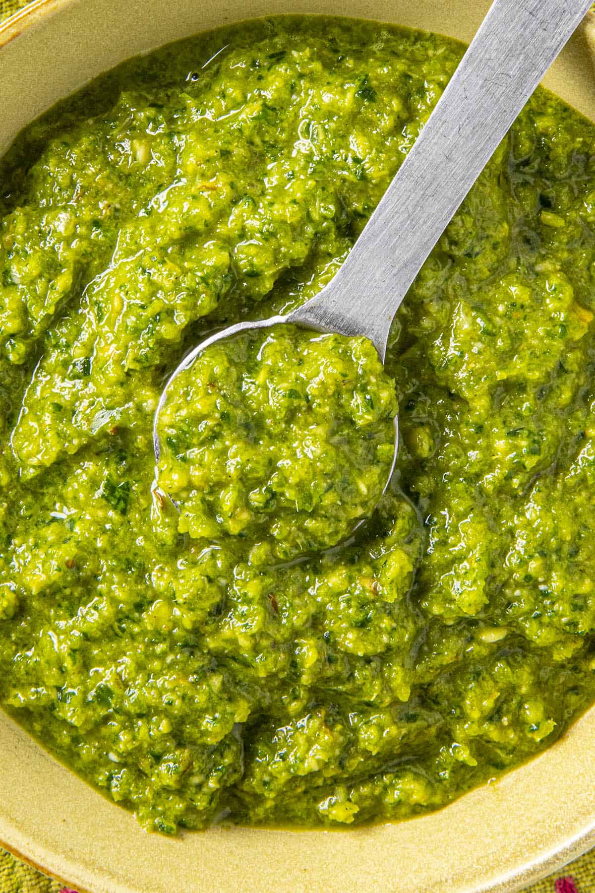 Green Curry Paste on a spoon, ready for making curry