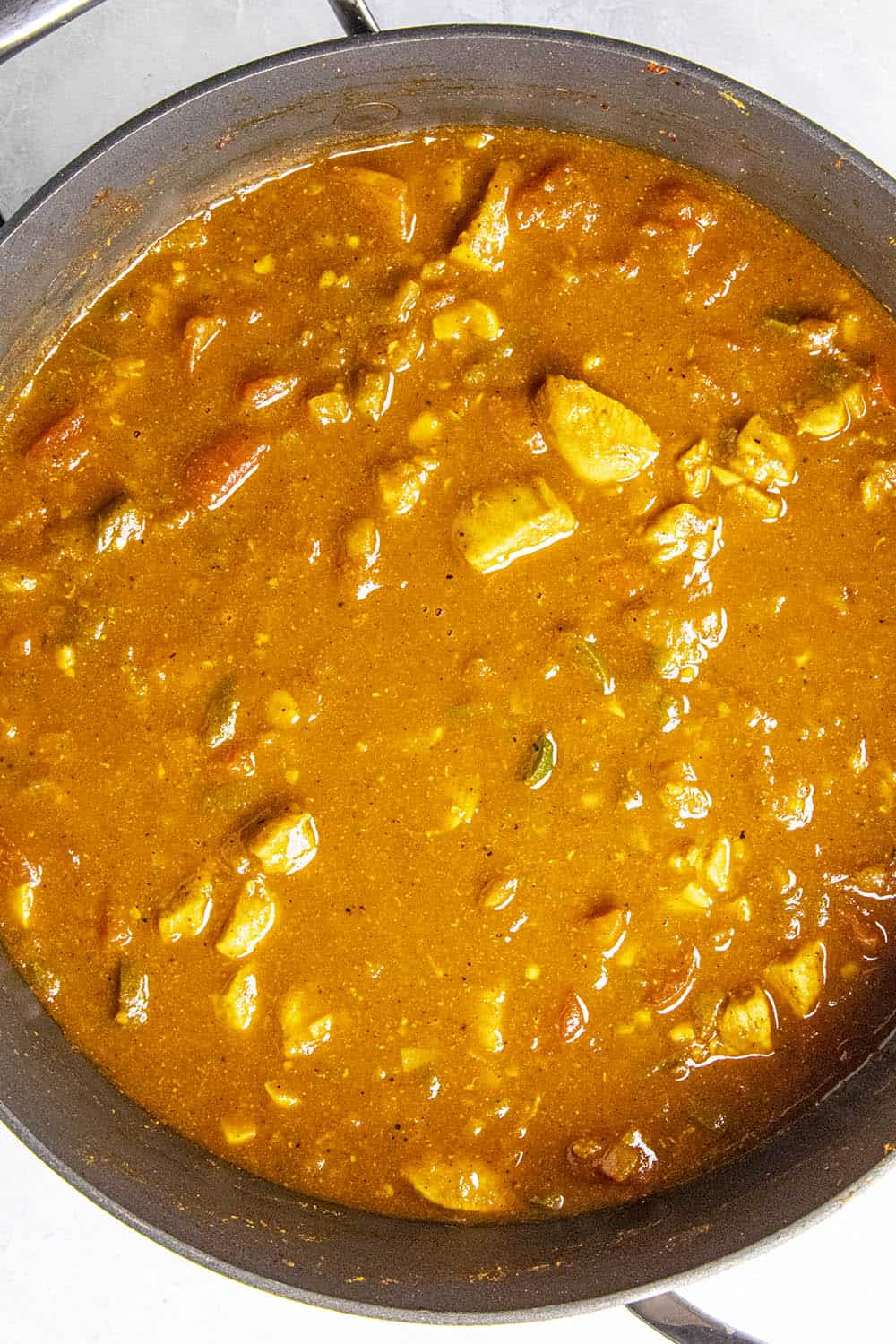 Spicy Chicken Phall Curry simmering in the pot