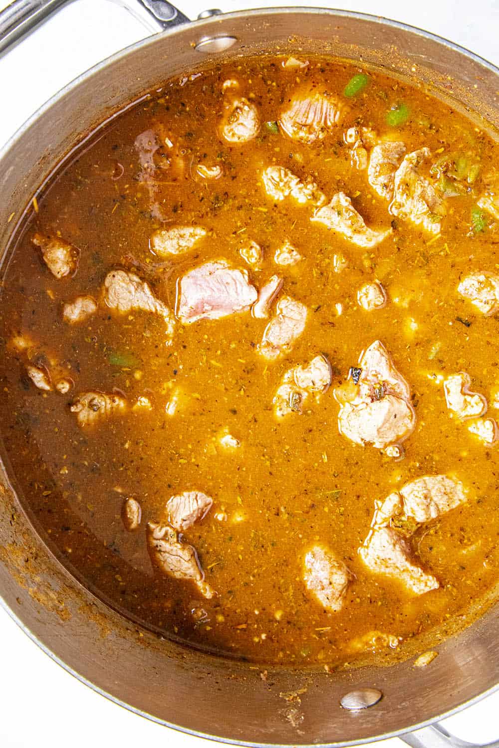 Carne Adovada simmering in a pot