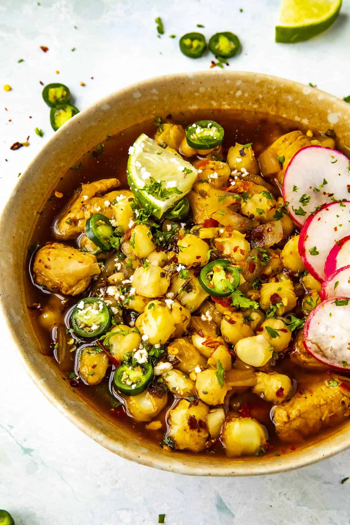 A bowl of Chicken Pozole Rojo, ready to enjoy