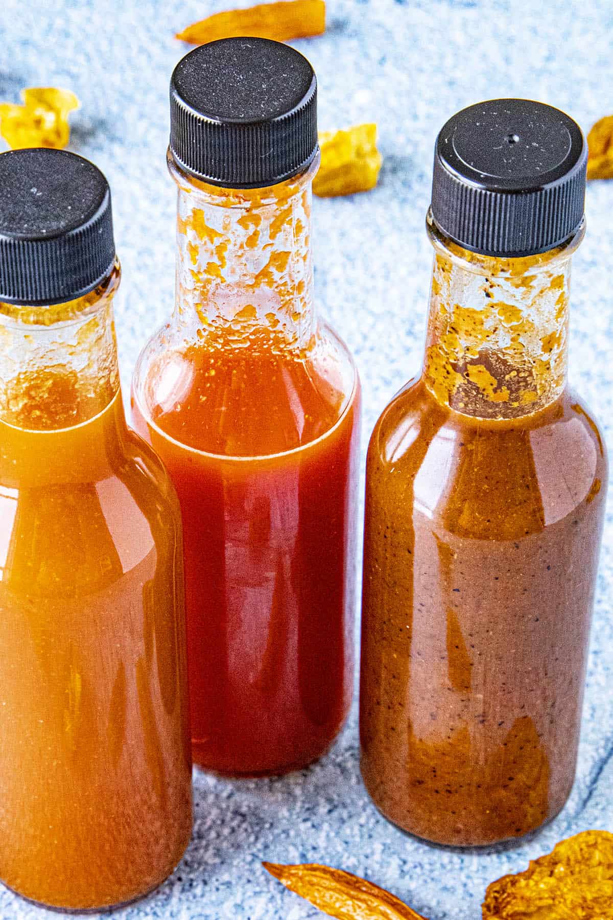 3 bottles of hot sauce looking super good