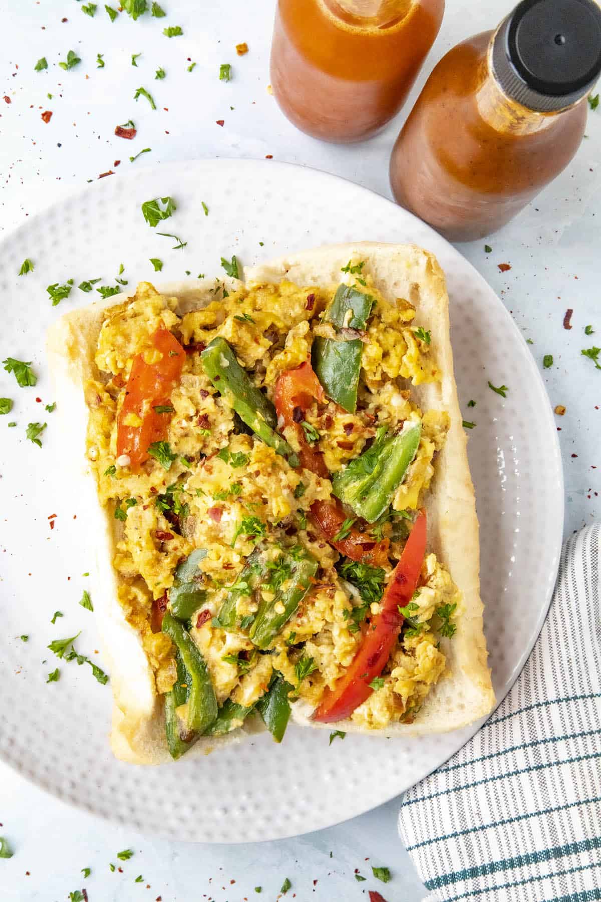 Pepper and Egg Sandwich with lots of peppers and hot sauce