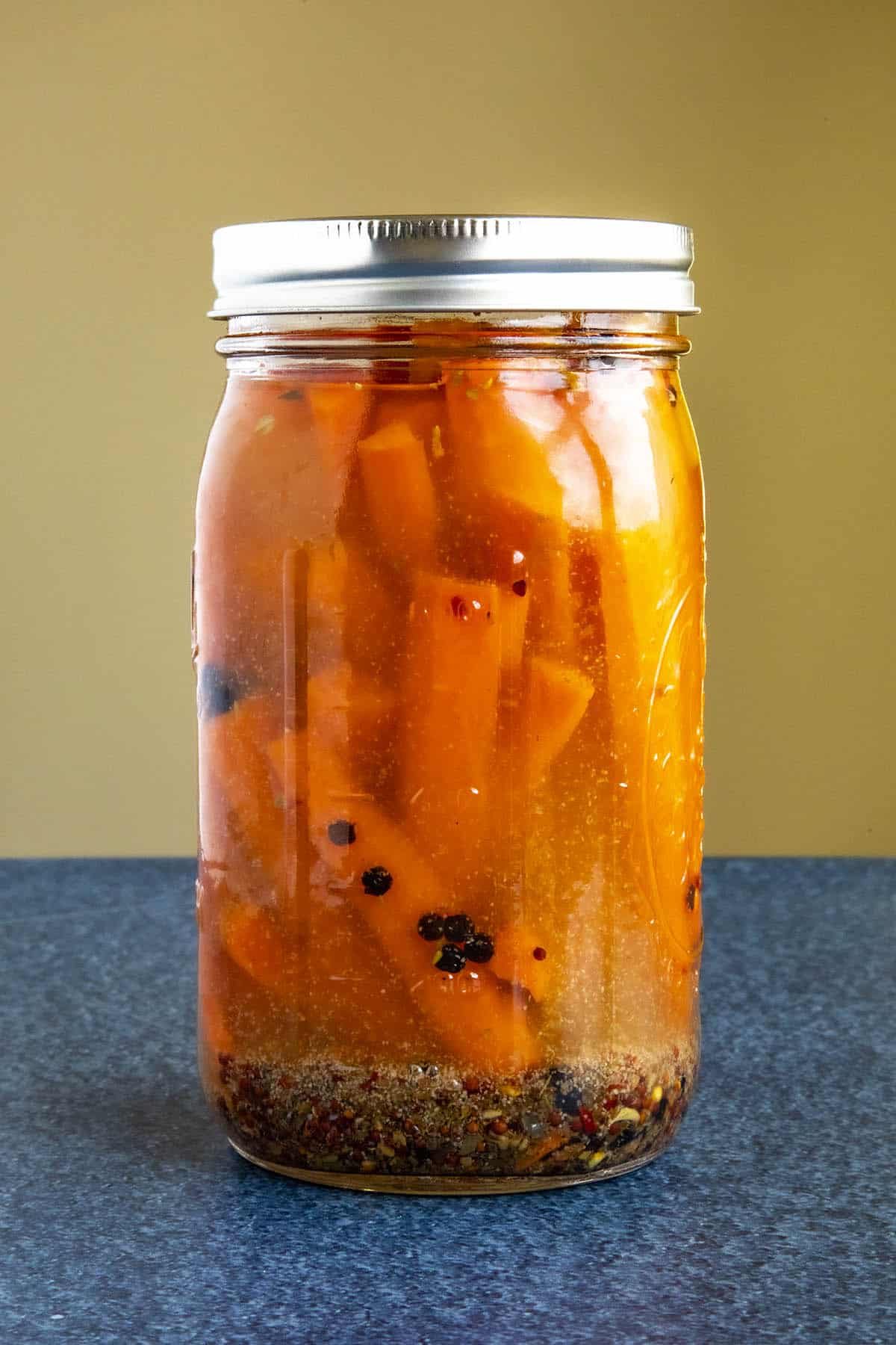 Pickled Carrots in a jar with lots of seasonings