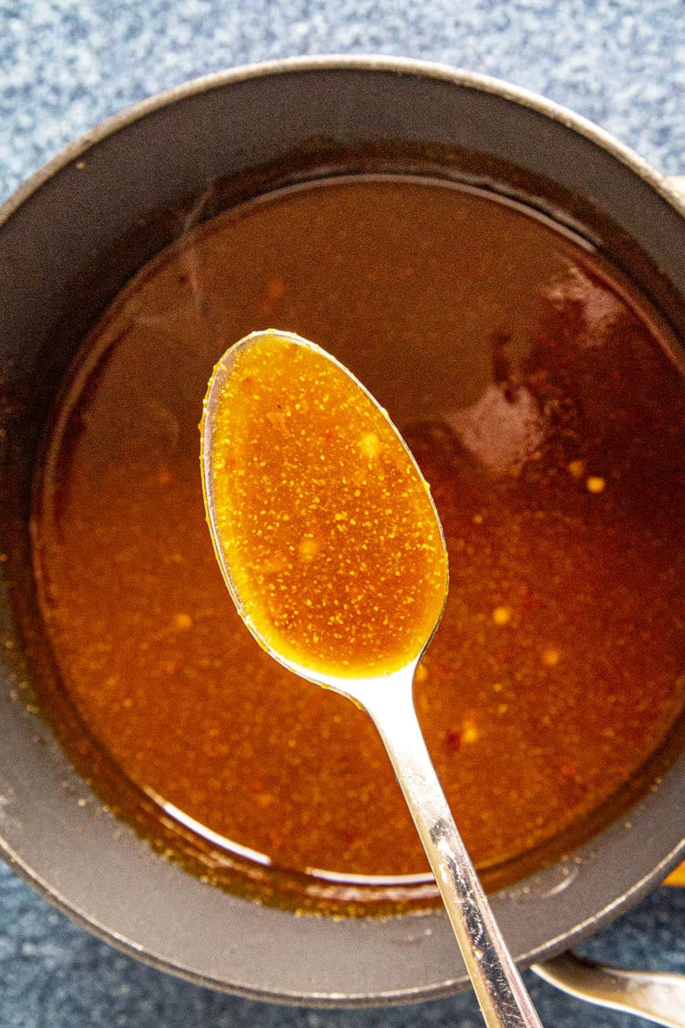 A spoonful of Szechuan Sauce from the pot