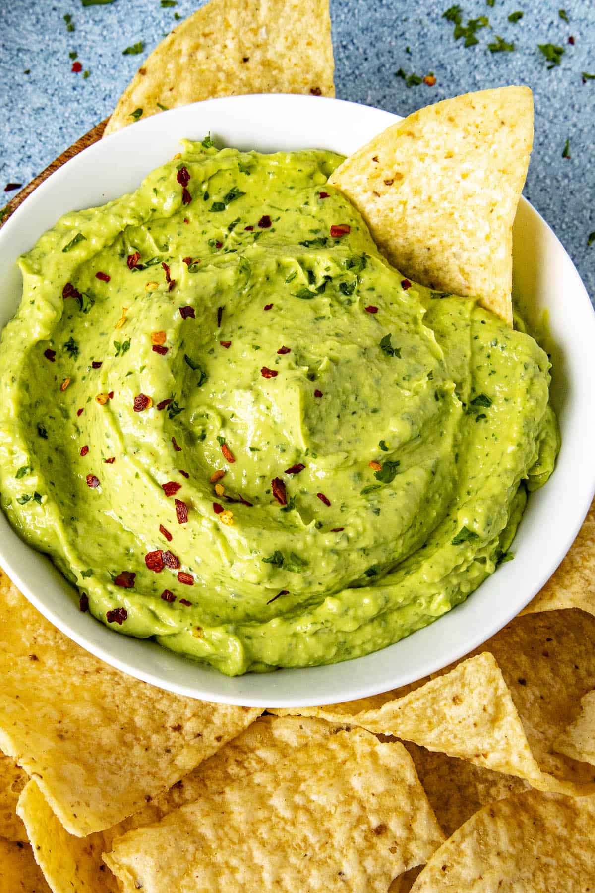 Guasacaca in a bowl with a chip