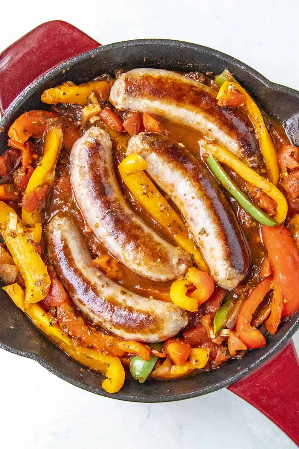 Simmering my Sausage and Peppers in a hot pan.