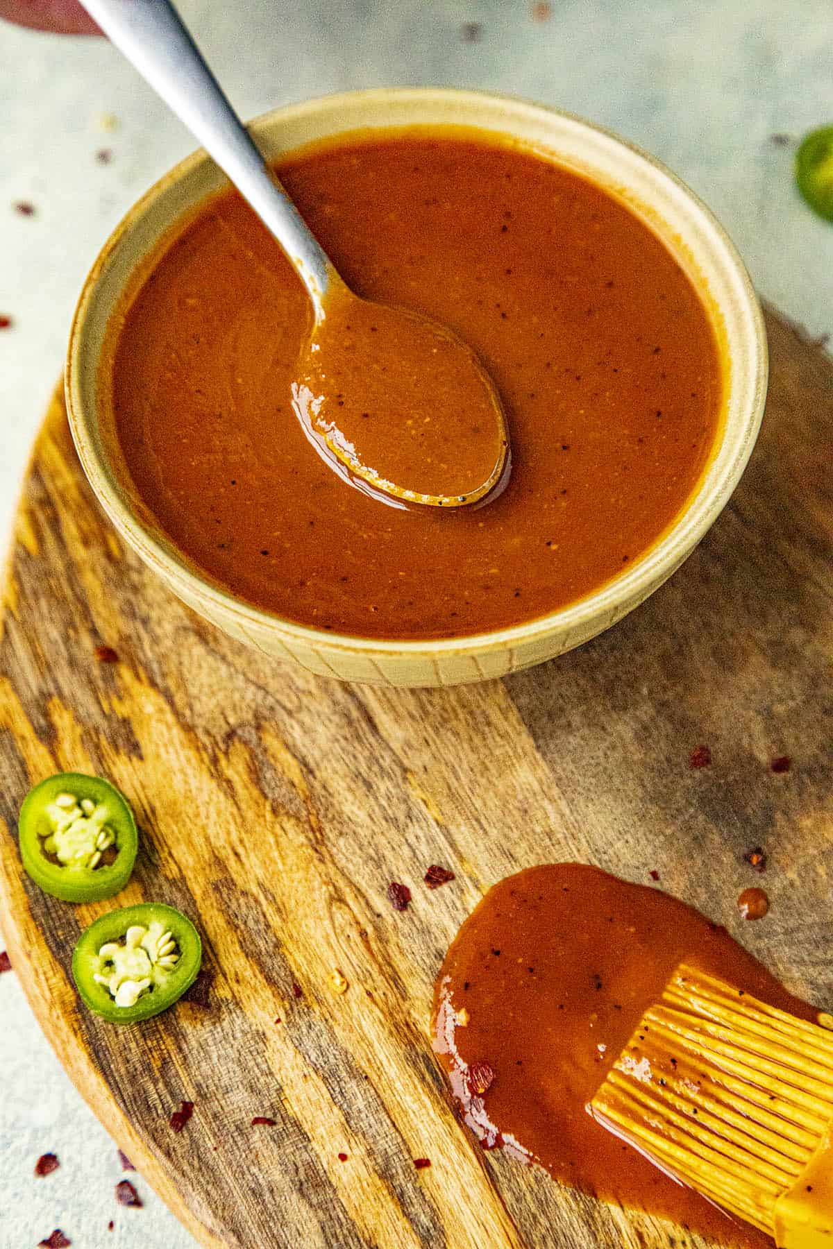 Sweet and Spicy BBQ Sauce on a spoon, ready to serve