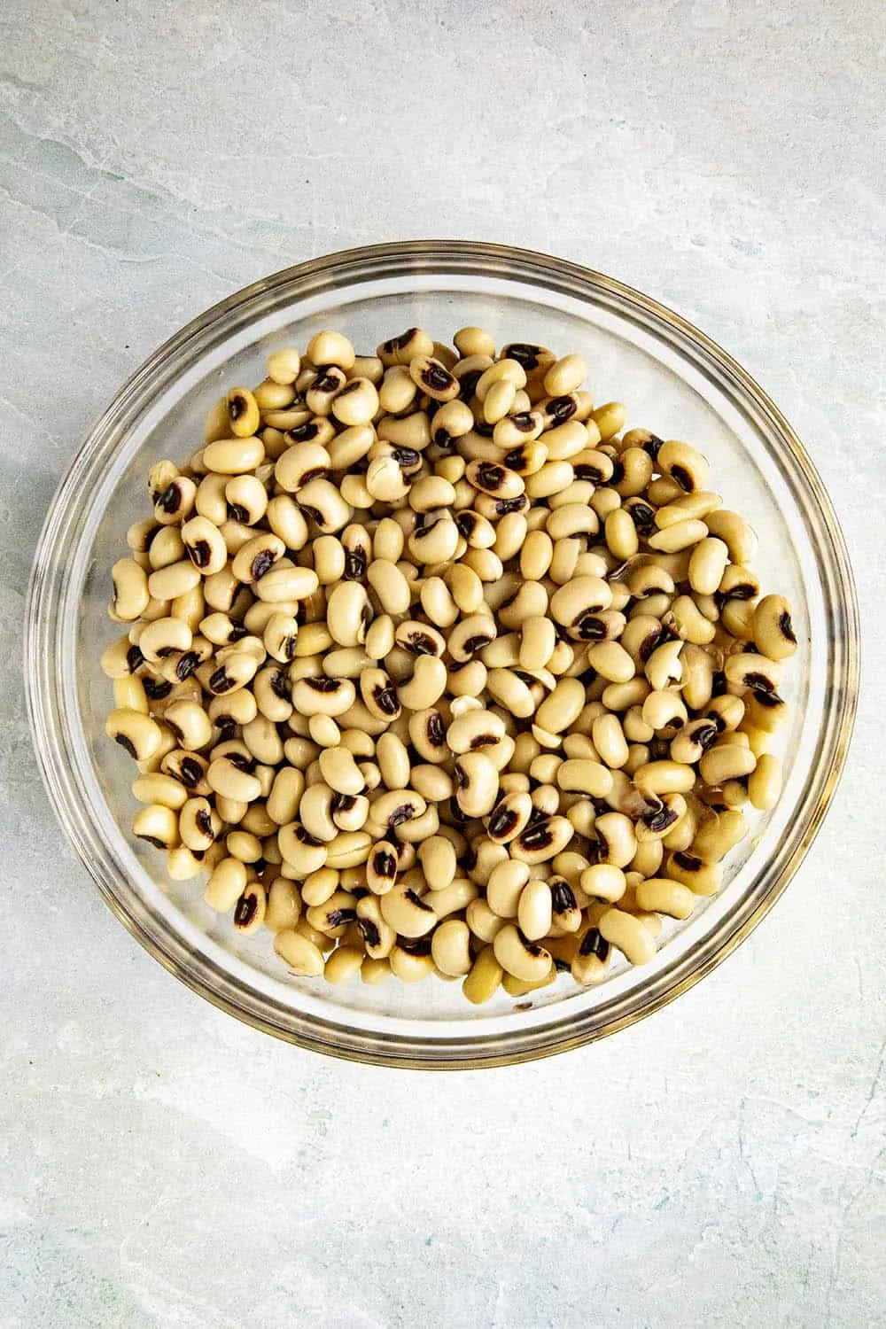 Black eyed peas in a bowl, soaked and ready for cooking