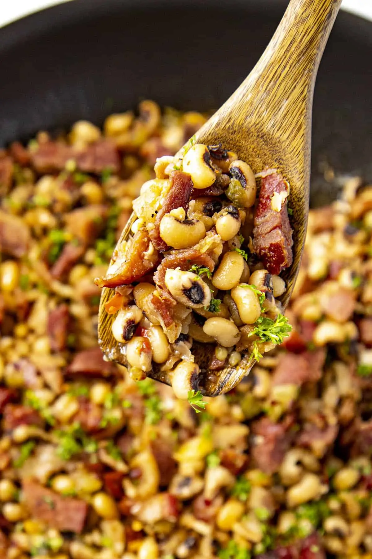 A scoop of Black Eyed Peas on a spoon