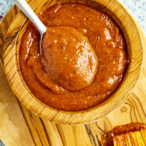 Easy Homemade BBQ Sauce on a spoon, ready to serve
