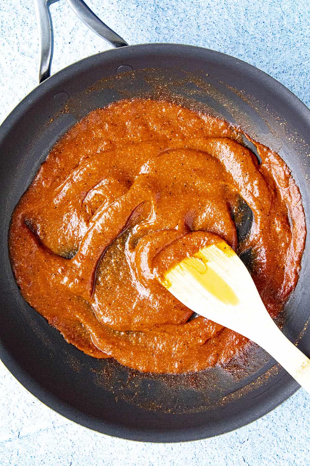Stirring the bbq sauce in the pan