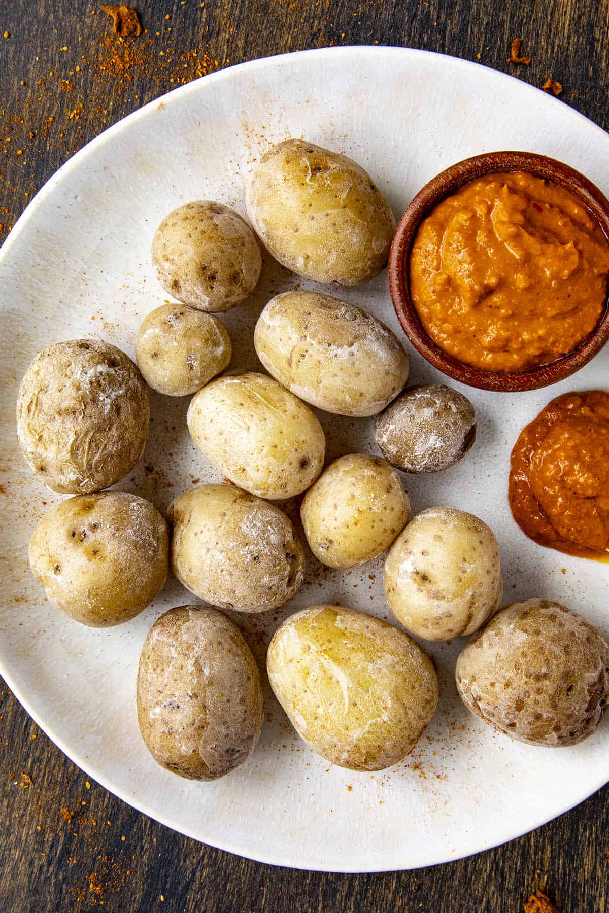Canarian Papas Arrugadas, or wrinkly potatoes appetizer, on a serving plate