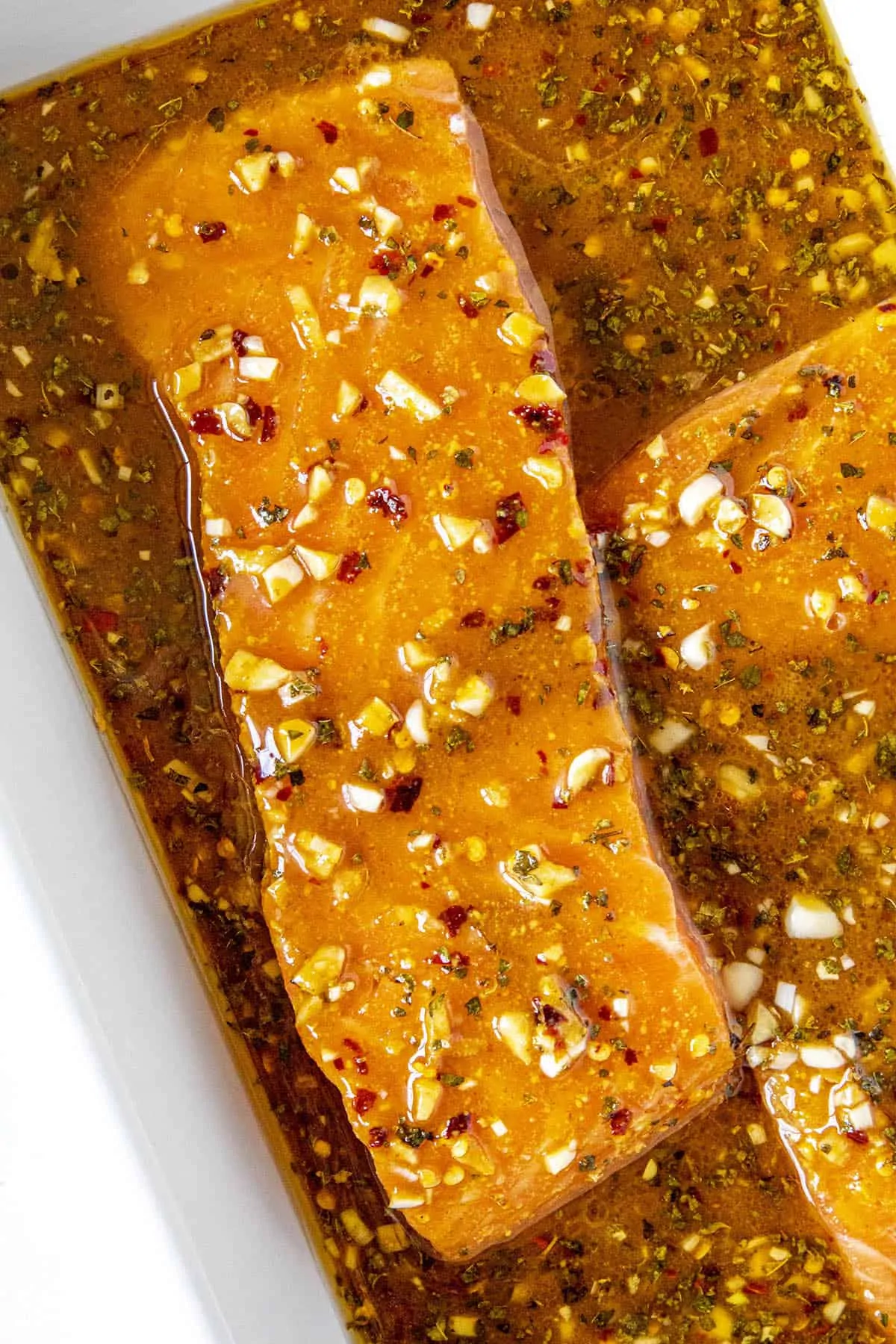 Salmon marinating in a spicy salmon marinade