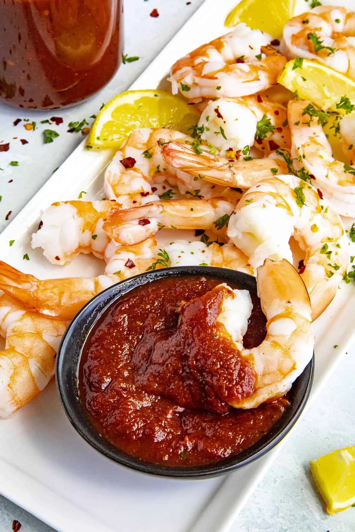 Chili Sauce in a bowl with a piece of succulent shrimp