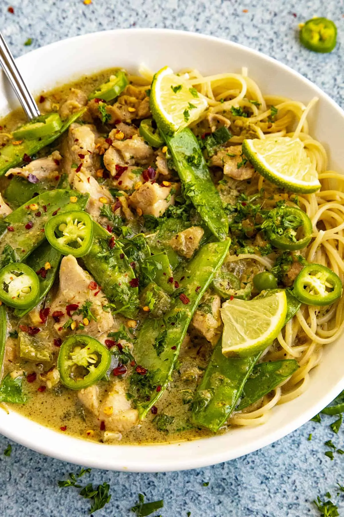 Spicy green curry in a bowl.