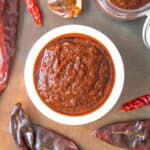 Homemade Red Enchilada Sauce in a white bowl